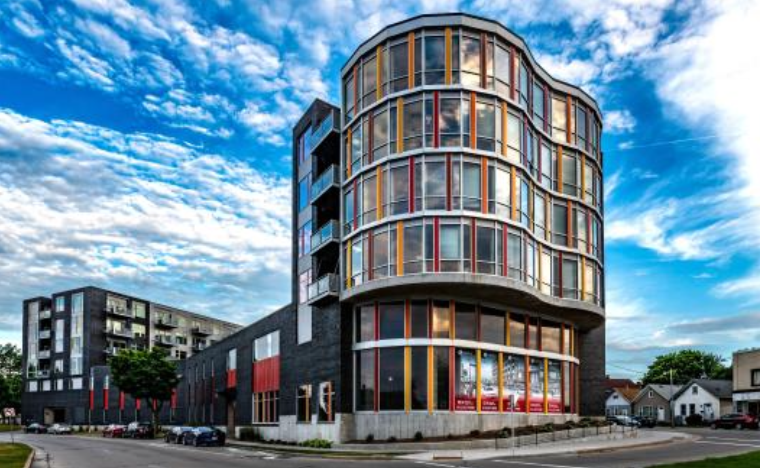 Curved corner mixed-use building in Bay View